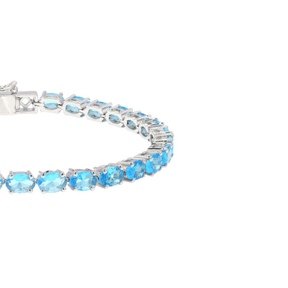 Oval Swiss Blue Topaz Tennis Bracelet