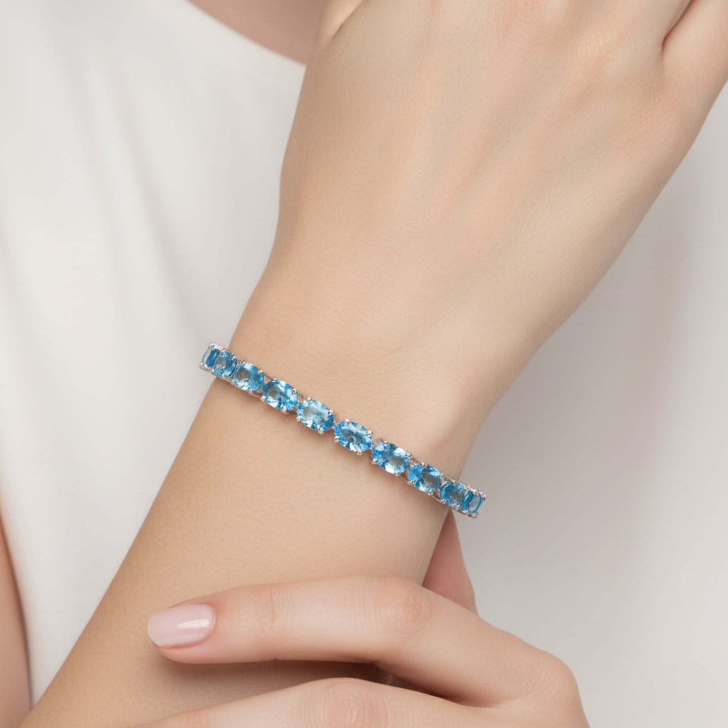 Oval Swiss Blue Topaz Tennis Bracelet