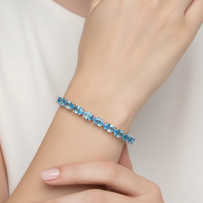 Oval Swiss Blue Topaz Tennis Bracelet